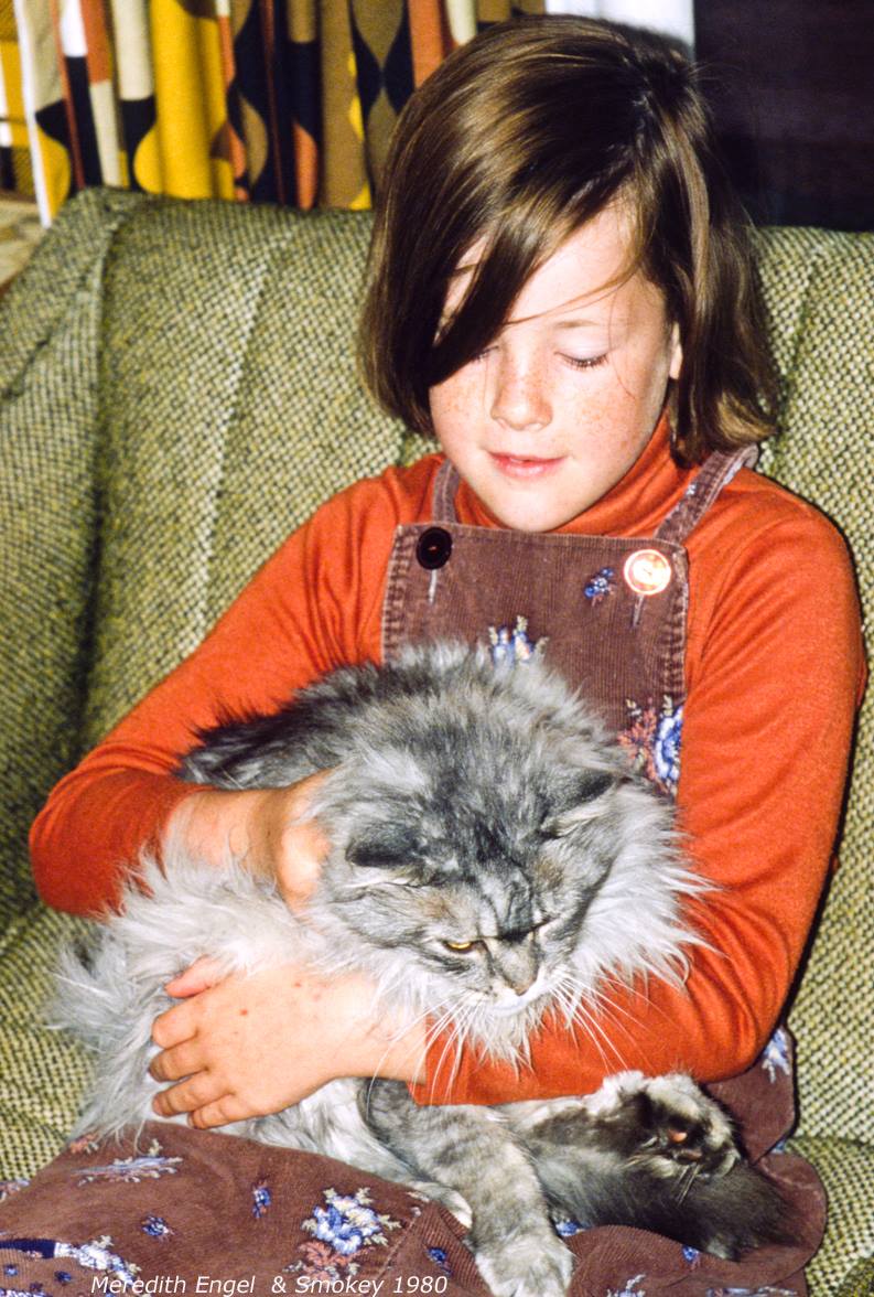 child with cat