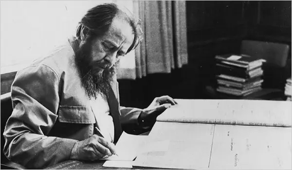 Alexander Solzhenitsyn working at his desk, credit to New York Times
